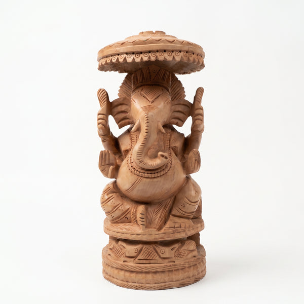 Lord Ganesha Beneath the Sacred Canopy – Wooden Carved Sculpture