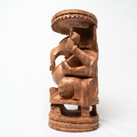 Lord Ganesha Beneath the Sacred Canopy – Wooden Carved Sculpture